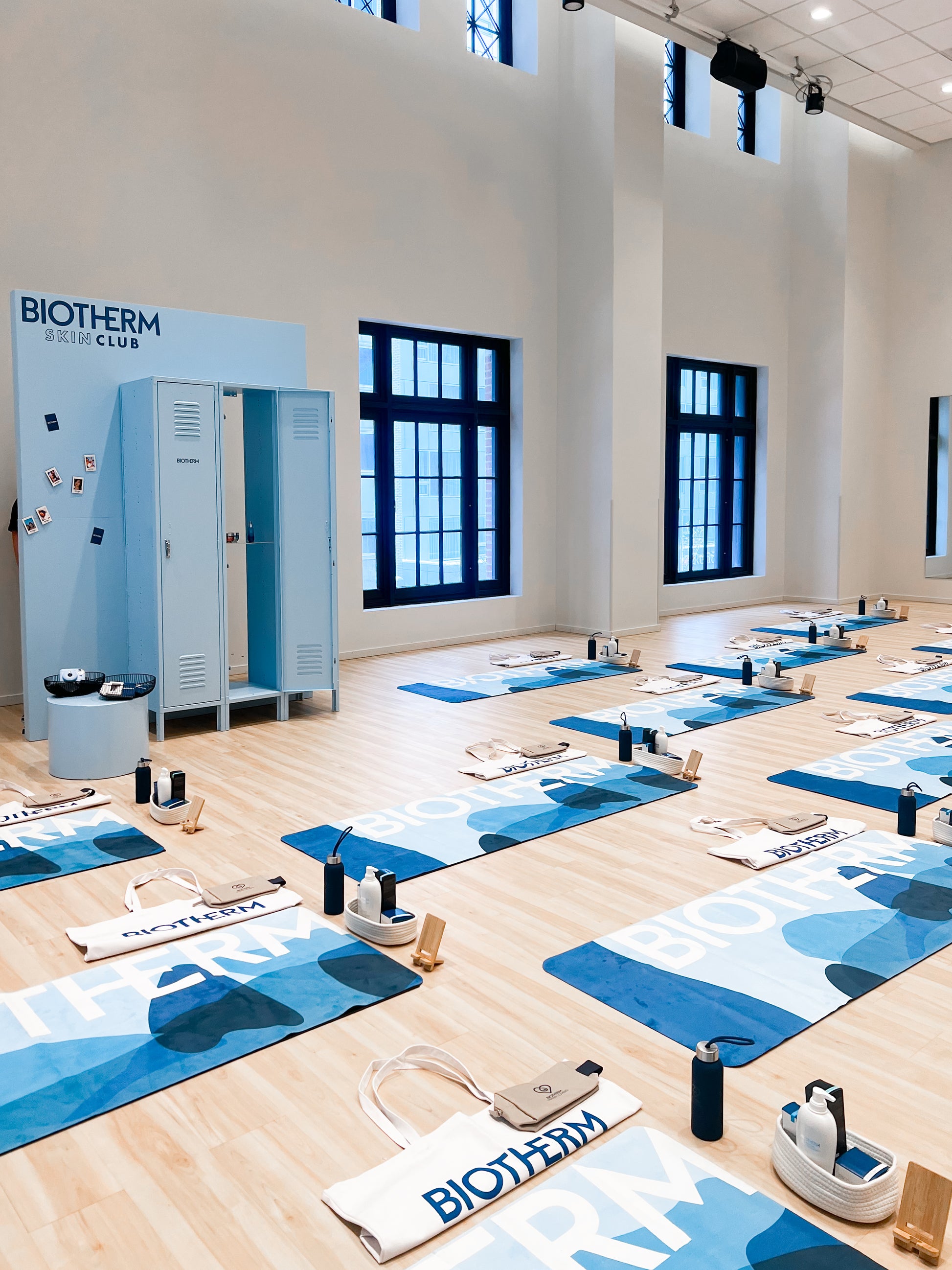 Locker wall display with functional doors, used for brand activation and interactive event setups.